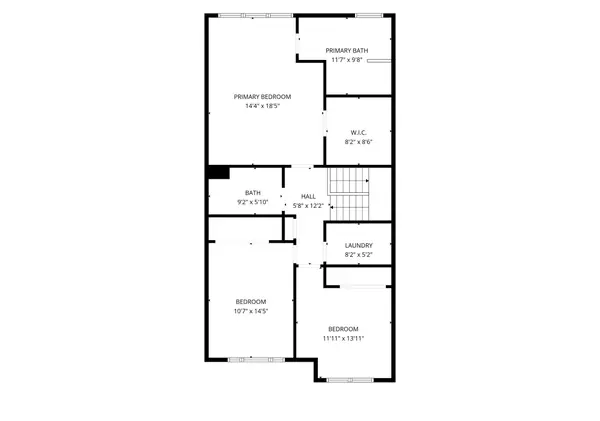 Floor plan — upper level with primary suite, two bedrooms and laundry