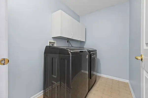 Laundry room with washer and dryer