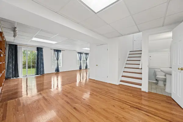 Walkout basement recreation room with half bath